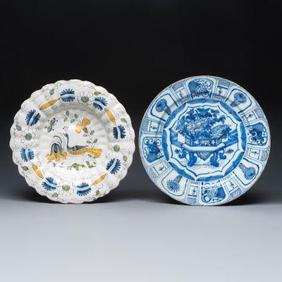A polychrome Dutch Delft gadrooned 'Peacock' dish and a blue and white Wanli-style dish, 17th C.