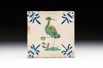 A polychrome Dutch Delft 'heron' tile, 17th C.