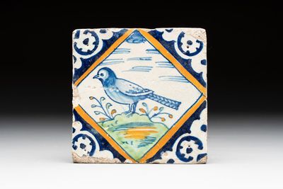 A polychrome Dutch Delft maiolica 'bird' diamond tile, late 16th C.