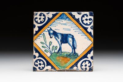 A polychrome Dutch Delft maiolica 'horse' tile, late 16th C.