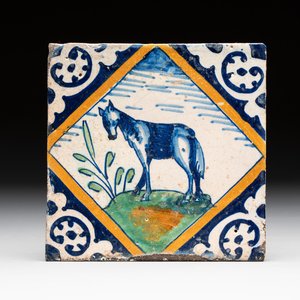 A polychrome Dutch Delft maiolica 'horse' tile, late 16th C. — photo 1