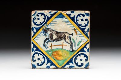 A polychrome Dutch Delft maiolica 'jumping goat' tile, late 16th C.