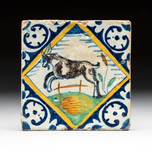 A polychrome Dutch Delft maiolica 'jumping goat' tile, late 16th C. — photo 1
