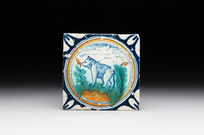 A polychrome Dutch Delft maiolica 'medallion' 'bear' tile, late 16th C.