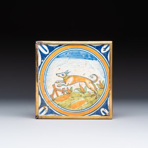 A polychrome Dutch Delft maiolica medallion tile with a leaping dog — photo 1