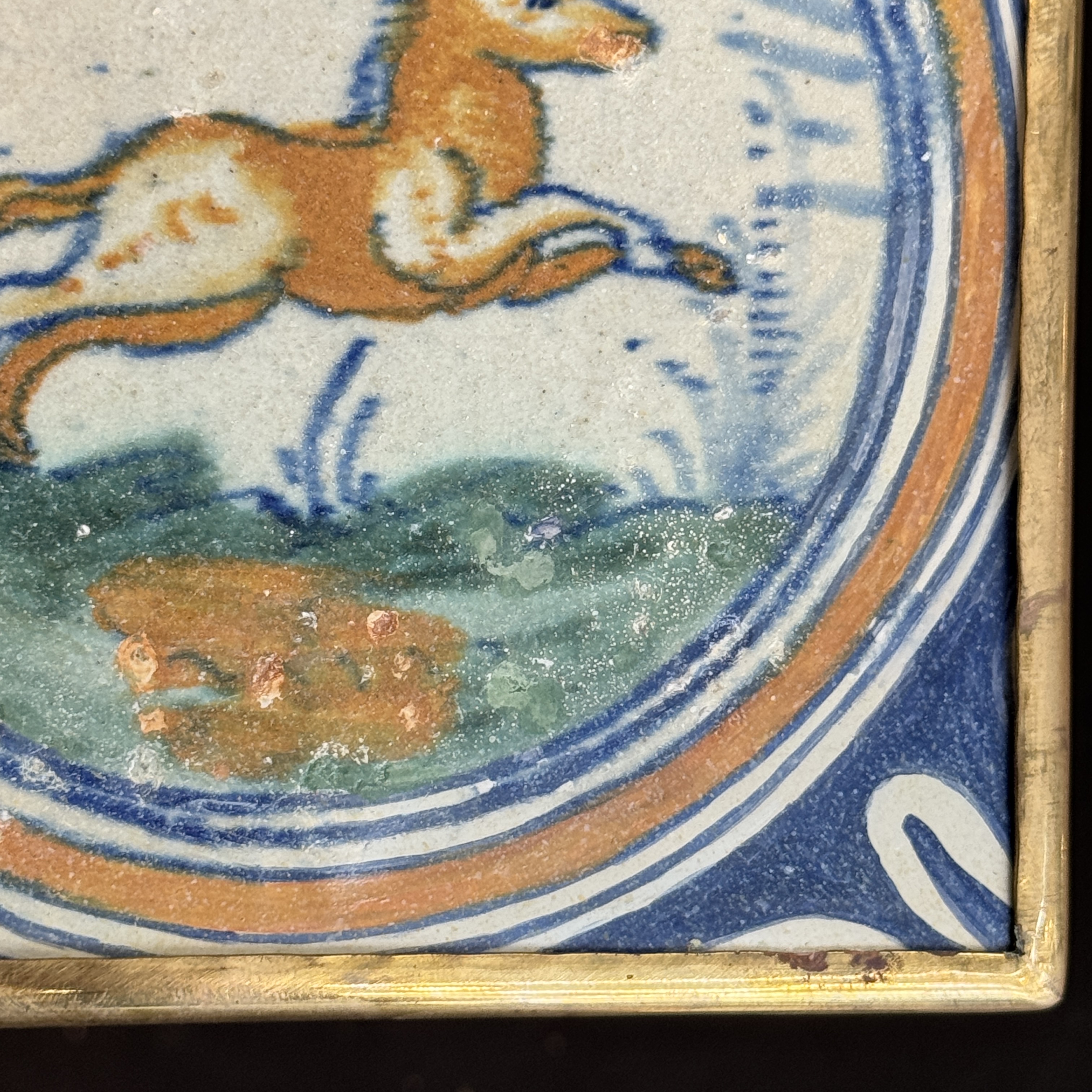 A polychrome Dutch Delft maiolica medallion tile with a leaping horse — photo 4