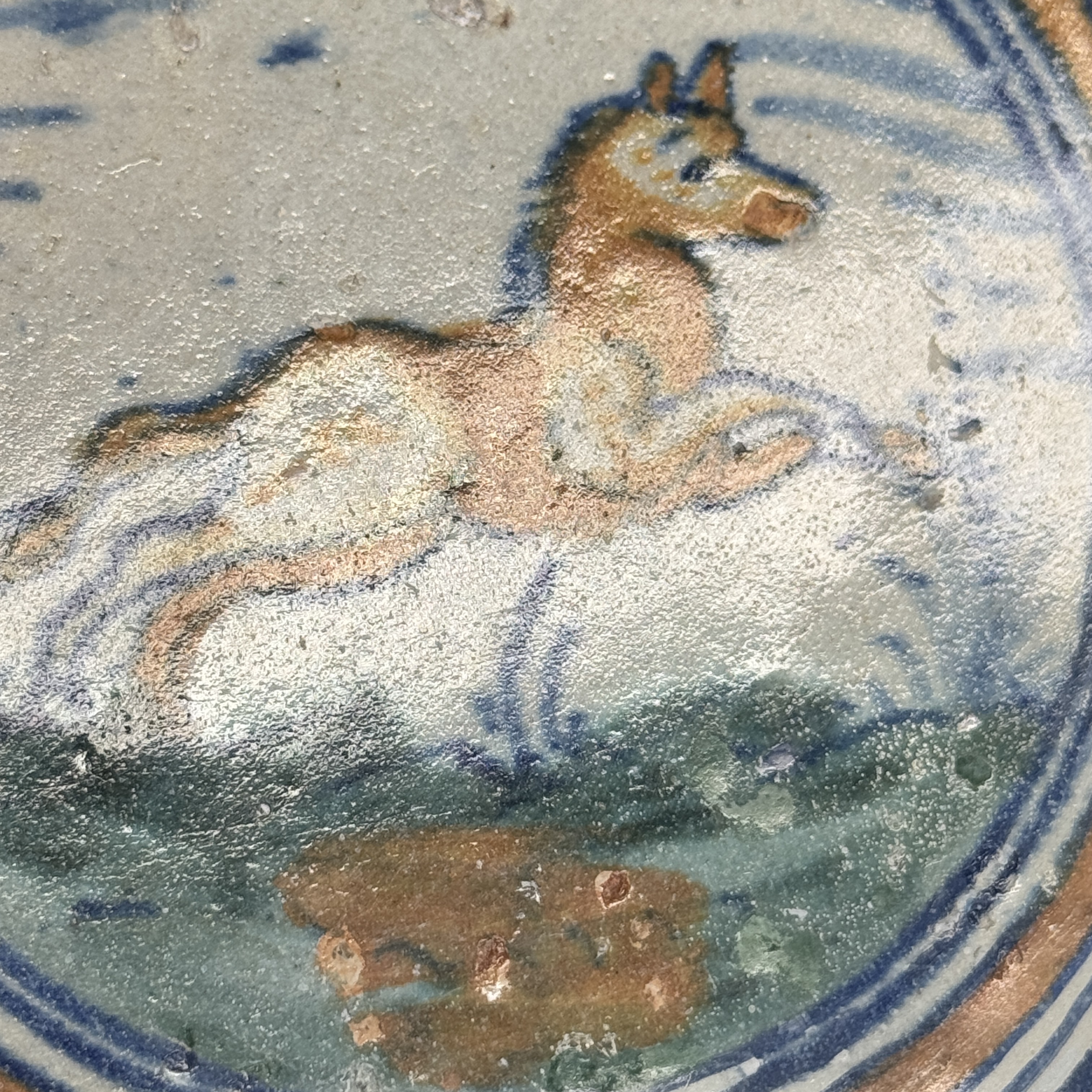 A polychrome Dutch Delft maiolica medallion tile with a leaping horse — photo 5