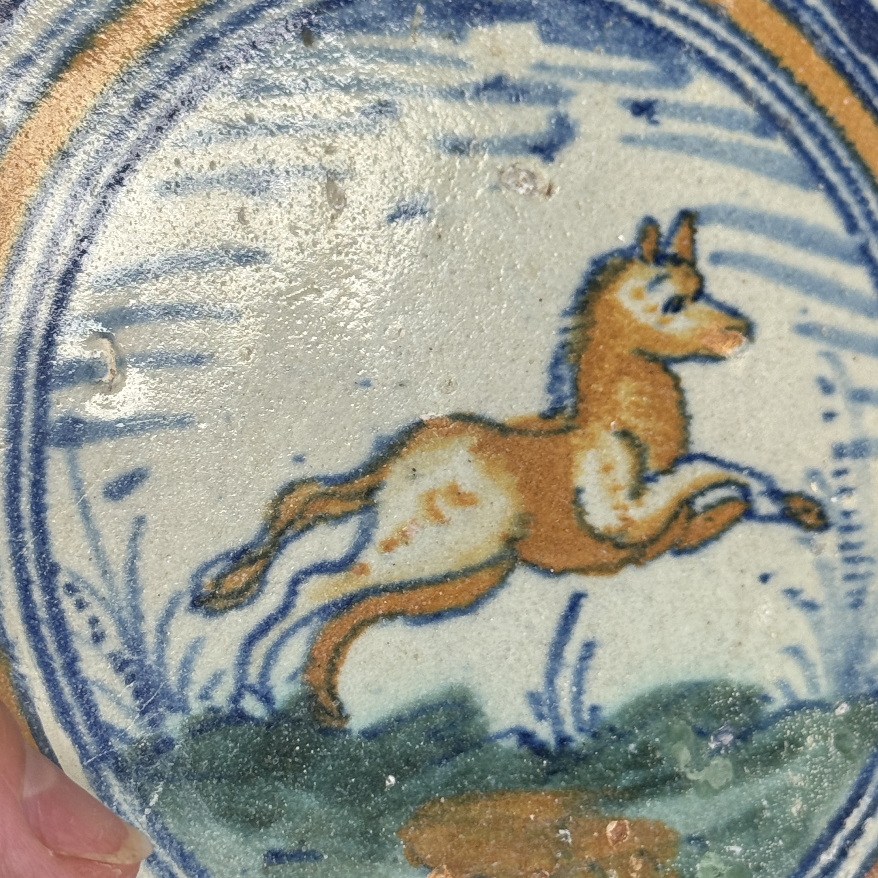 A polychrome Dutch Delft maiolica medallion tile with a leaping horse — photo 6