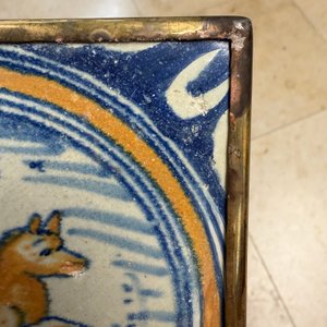 A polychrome Dutch Delft maiolica medallion tile with a leaping horse — photo 7