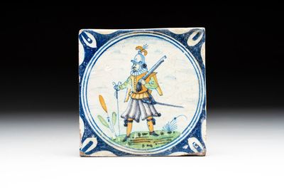 A polychrome Dutch Delft maiolica 'soldier' medallion tile, late 16th C.