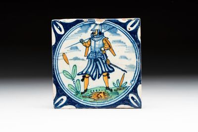 A polychrome Dutch Delft maiolica 'soldier' ​​medallion tile, late 16th C.