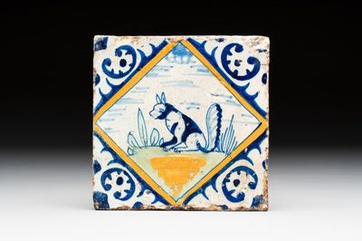 A polychrome Dutch Delft maiolica 'squirrel' diamond tile, late 16th C.