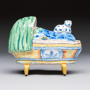 A polychrome Dutch Delft model of a child in a cradle with a cat — photo 2