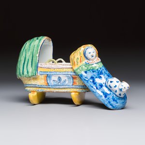 A polychrome Dutch Delft model of a child in a cradle with a cat — photo 6