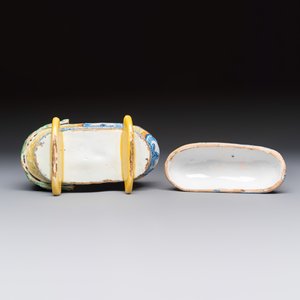 A polychrome Dutch Delft model of a child in a cradle with a cat — photo 8