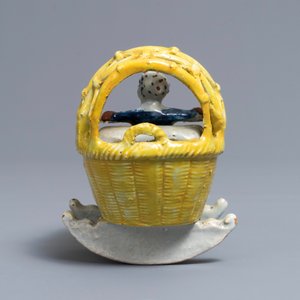 A polychrome Dutch Delft model of a girl in a cradle, 18th C. — 照片 5