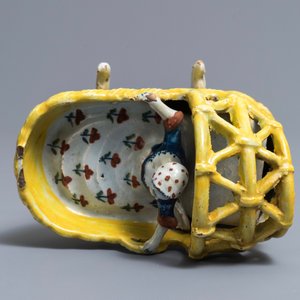 A polychrome Dutch Delft model of a girl in a cradle, 18th C. — 照片 7