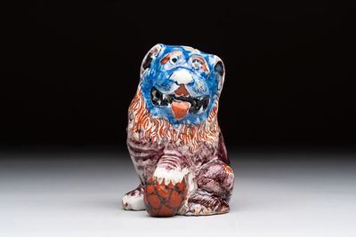 A polychrome Dutch Delft model of a lion, 18th C.