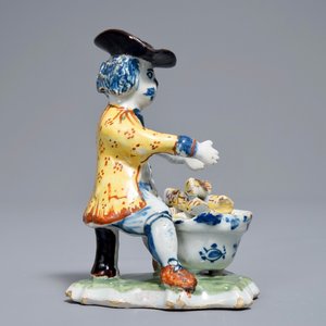 A polychrome Dutch Delft model of a man near a stove, 18th C. — photo 3