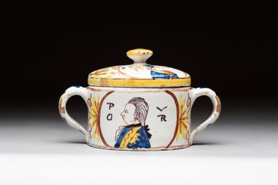 A polychrome Dutch Delft 'orangist' butter tub, 18th C.