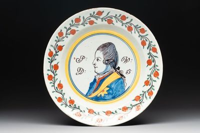 A polychrome Dutch Delft 'orangist' 'royal portrait' plate, 18th C.