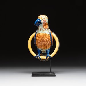 A polychrome Dutch Delft parrot on a later metal stand, 18/19th C. — photo 1