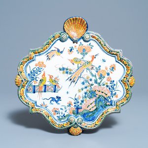 A polychrome Dutch Delft plaque with birds in a Chinese garden, 18th C. — photo 1