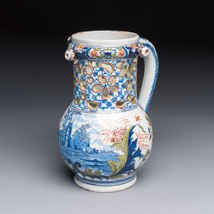 A polychrome Dutch Delft puzzle jug with a landscape scene — photo 1