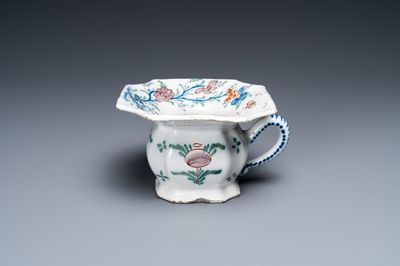 A polychrome Dutch Delft spittoon, 18th C.