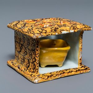 A polychrome Dutch Delft stove with brazier, dated 1776 — 照片 1