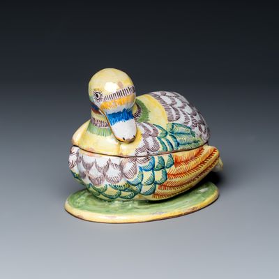 A polychrome Dutch Delft tureen and cover in the shape of a duck, 19th C.