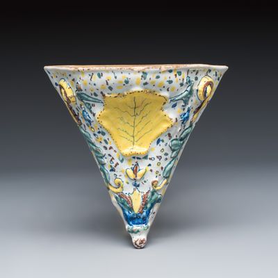 A polychrome English Delftware triangular wall console, probably Liverpool, 18th C.