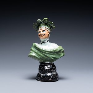 A polychrome French faience candlestick in the shape of a man, 18th C. — photo 1