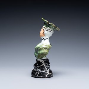 A polychrome French faience candlestick in the shape of a man, 18th C. — photo 4
