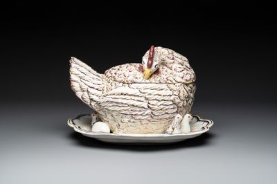 A polychrome French faience 'hen' tureen and cover, Ferrière-la-Petite, 18th C.