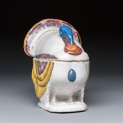 A polychrome German faience 'Turkey' tureen and cover, 18th C.