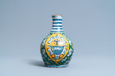 A polychrome Italian maiolica armorial pharmacy bottle, Deruta, 17th C.