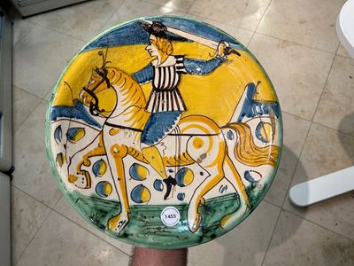 A polychrome Italian maiolica dish with a horserider, Montelupo, 17th C. — photo 1