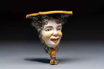 A polychrome Italian maiolica 'Faun Head' wall console, 19th C.