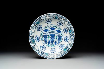 A polychrome Iznik 'grape' dish, Turkey, ca. 1570