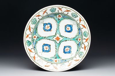 A polychrome Iznik pottery dish with stylised floral design, Turkey, ca. 1600