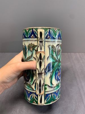 A polychrome Iznik-style mug with tulips and carnations, Kutahya, Turkey, 19th C. — photo 6