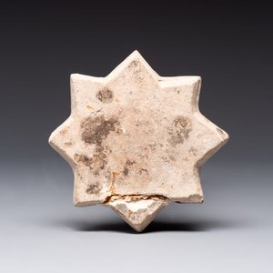 A polychrome Kashan relief-moulded star-shaped tile with herons, Persia, 14th C. — photo 2