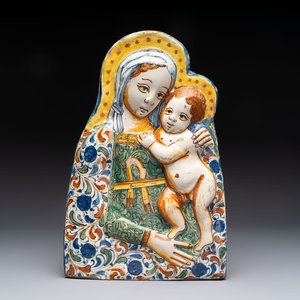 A polychrome molded Italian maiolica 'Madonna and Child' plaque, 17th C. — photo 1