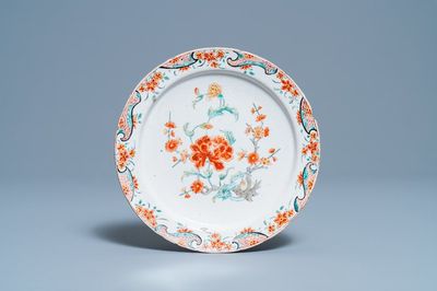 A polychrome petit feu Dutch Delft floral chinoiserie plate, 18th C.