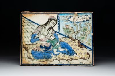 A polychrome Qajar pottery 'breastfeeding' tile, Iran, 19th C.