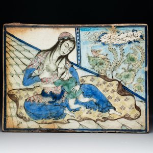 A polychrome Qajar pottery 'breastfeeding' tile, Iran, 19th C. — photo 1