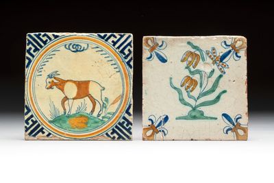 A polychrome Rotterdam 'goat' tile and a Dutch Delft 'flower and insect' tile, 17th C.