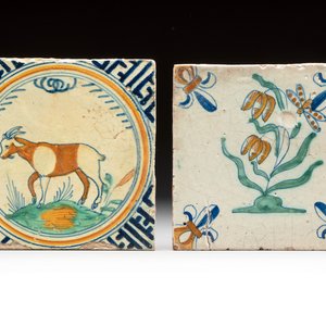 A polychrome Rotterdam 'goat' tile and a Dutch Delft 'flower and insect' tile, 17th C. — photo 1