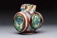 A polychrome Saintonge pottery barrel with a griffin, France, 16th C.